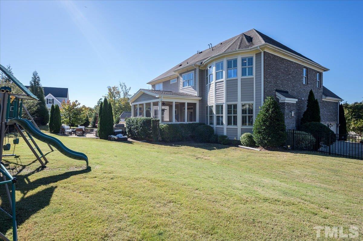 5100 Gansett Lane Raleigh, NC 27612 - Photo 35 of 39 a front view of a house with a yard