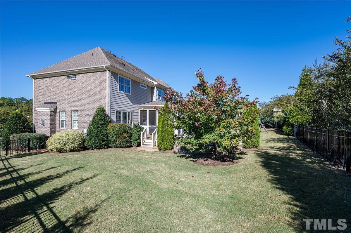 5100 Gansett Lane Raleigh, NC 27612 - Photo 36 of 39 a front view of a house with a yard