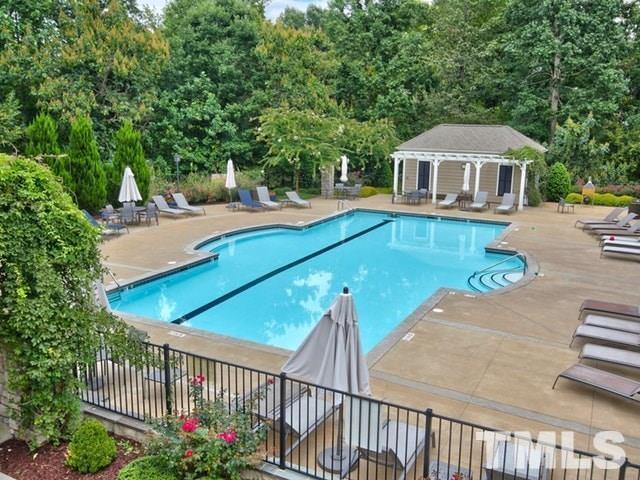 5100 Gansett Lane Raleigh, NC 27612 - Photo 38 of 39 a view of a house with backyard and sitting area