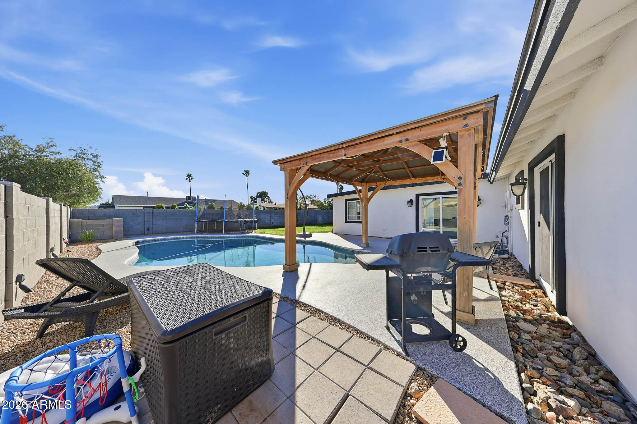 3317 East Bloomfield Road Phoenix, AZ 85032 - Photo 41 of 45 a view of a patio with table and chairs and potted plants