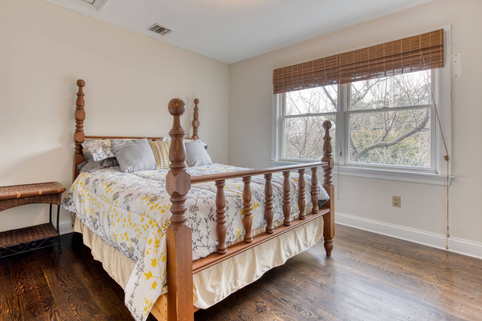 29 Club Lane Remsenburg, NY 11960 - Photo 8 of 9 a bed sitting in a bedroom next to a window