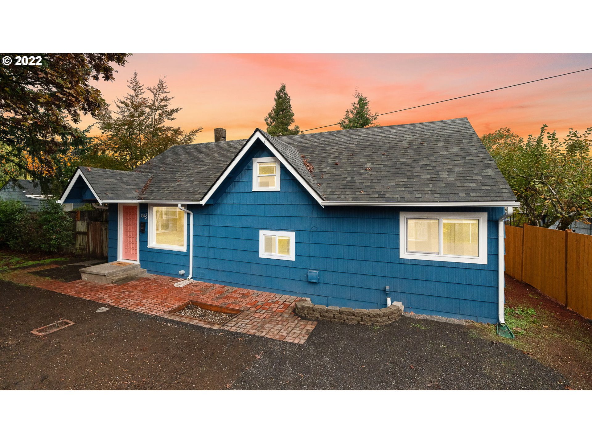 230 1/2 17th Street Springfield, OR 97477 - Photo 1 of 29 a backyard of a house with wooden fence