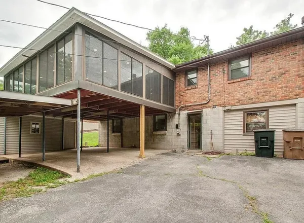 a front view of a house with a garage