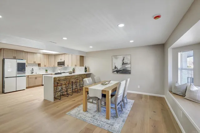 a view of a dining room kitchen and a window