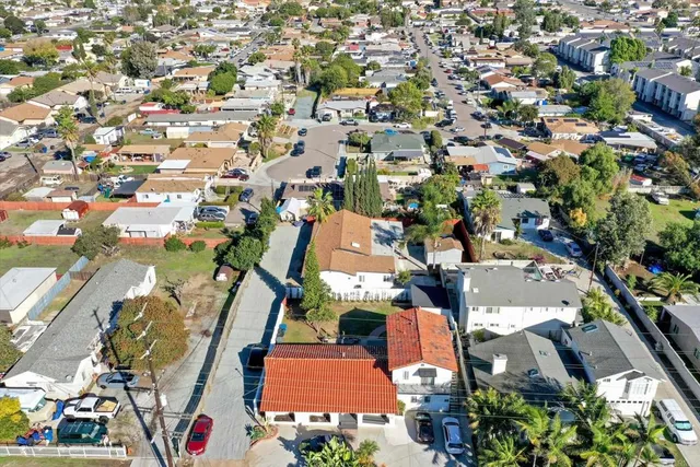 an aerial view of a city with lots of residential buildings