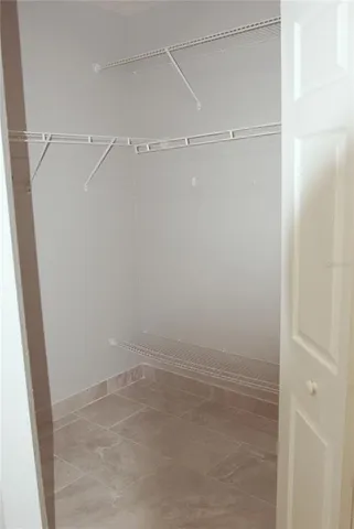 a view of an empty walk in closet