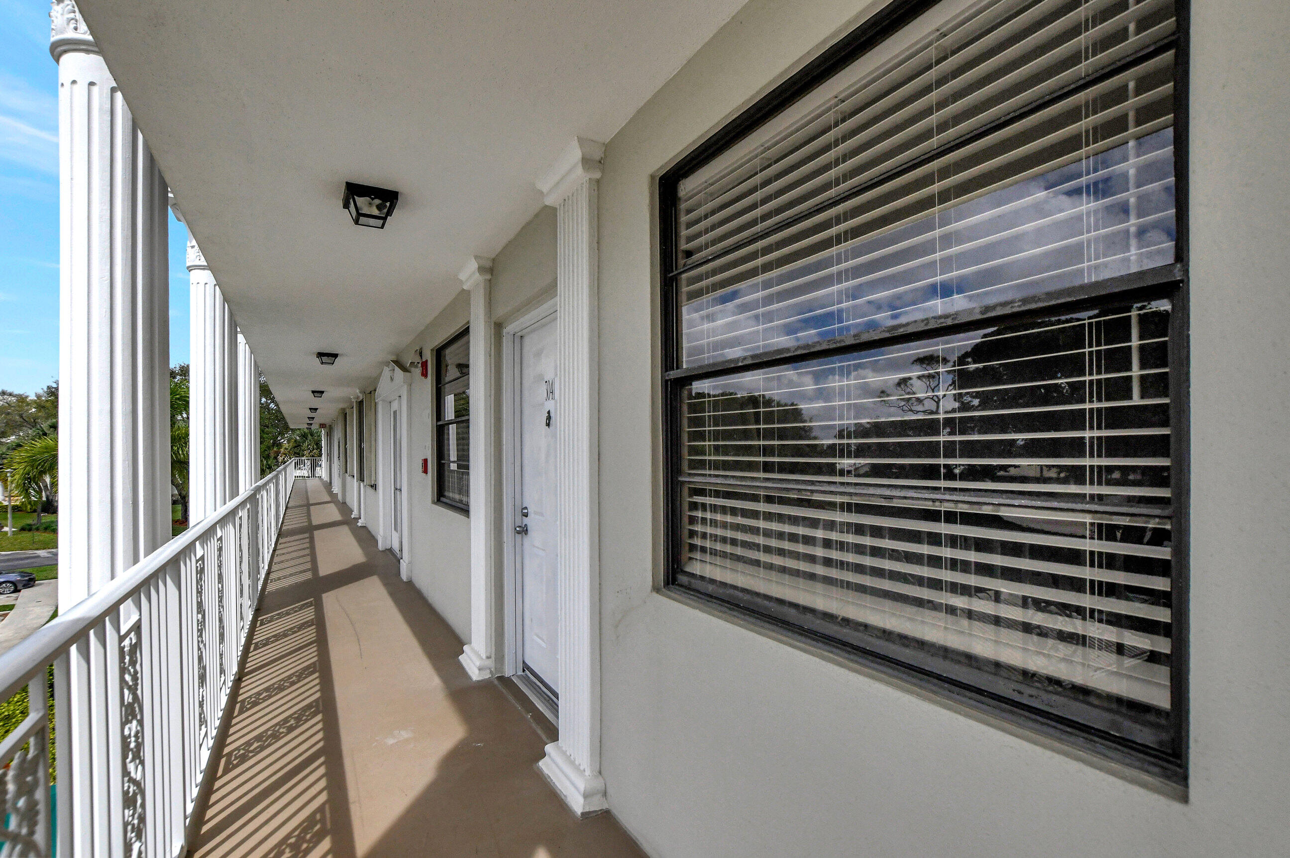 6025 Balboa Circle, Unit 304 Boca Raton, FL 33433 - Photo 24 of 38 a view of a balcony