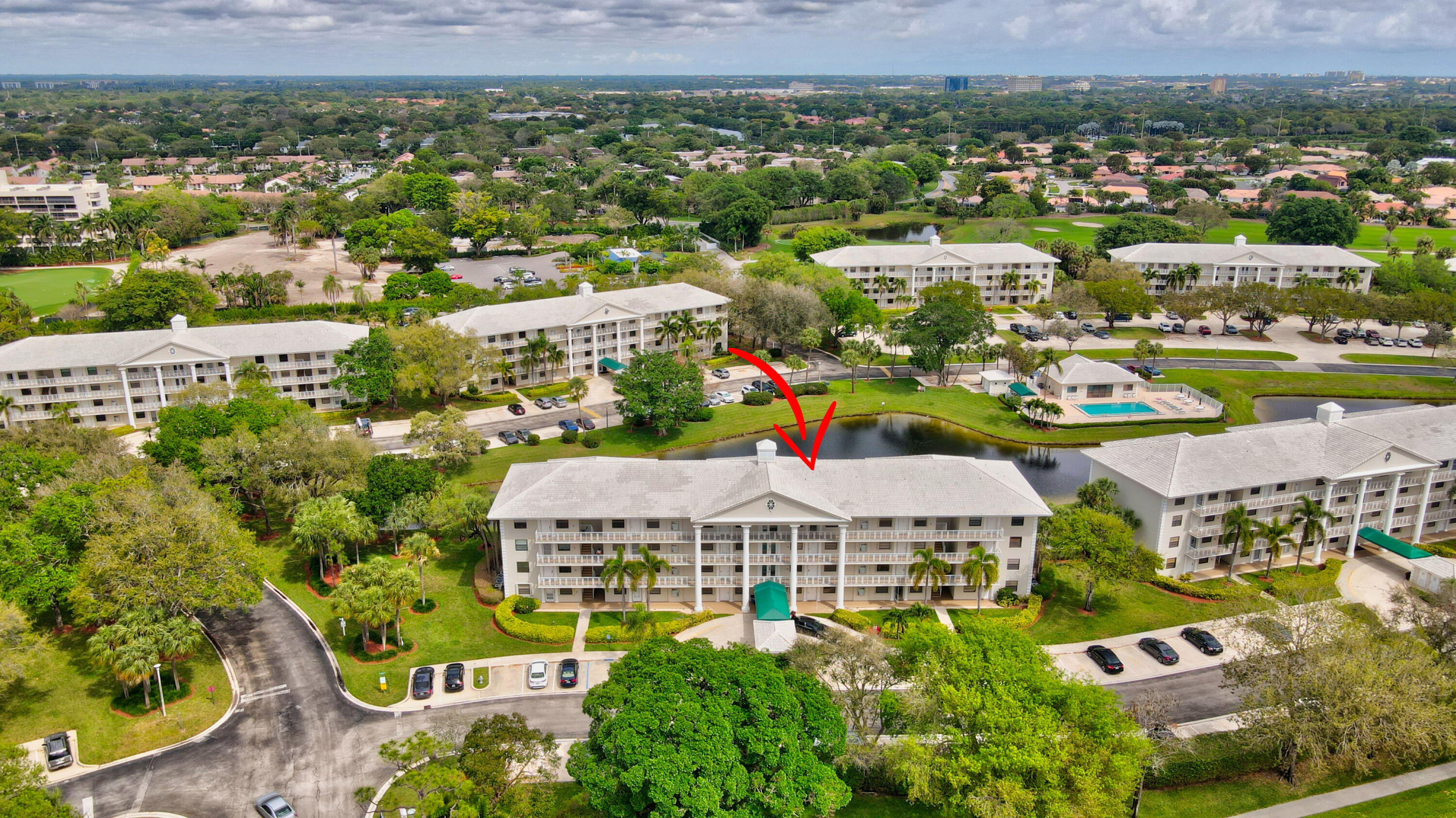 6025 Balboa Circle, Unit 304 Boca Raton, FL 33433 - Photo 27 of 38 an aerial view of multiple house