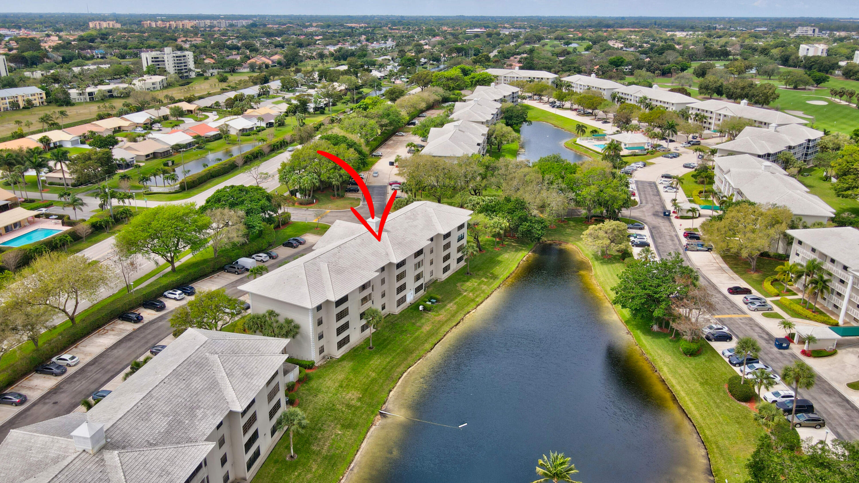 6025 Balboa Circle, Unit 304 Boca Raton, FL 33433 - Photo 28 of 38 an aerial view of a city