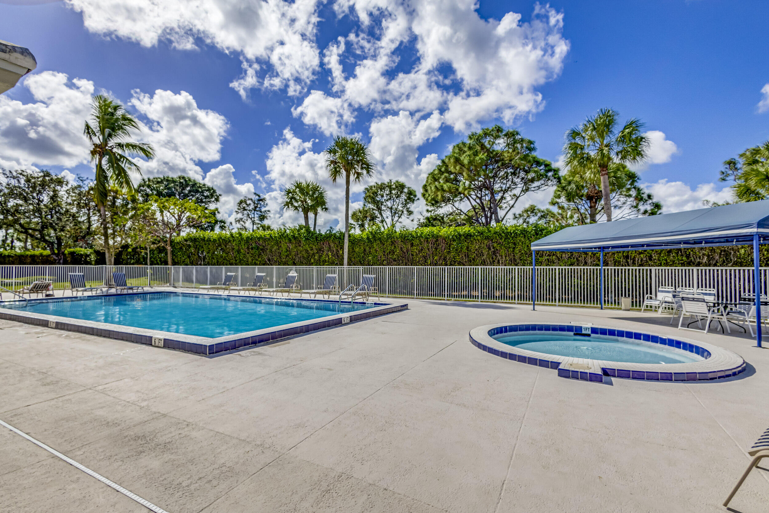 6025 Balboa Circle, Unit 304 Boca Raton, FL 33433 - Photo 35 of 38 a view of a backyard with swimming pool