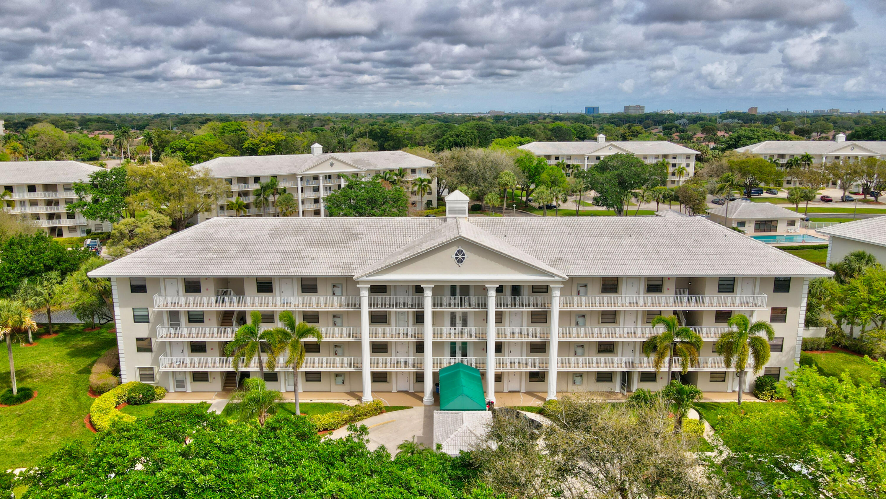 6025 Balboa Circle, Unit 304 Boca Raton, FL 33433 - Photo 37 of 38 an aerial view of multiple houses