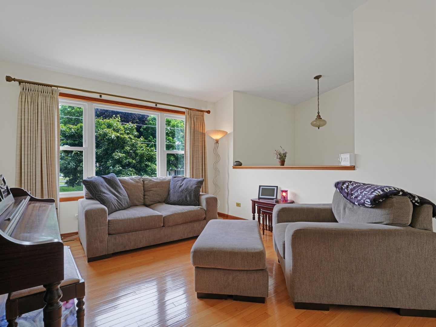 58 South Beck Road Lindenhurst, IL 60046 - Photo 12 of 37 a living room with furniture and a large window