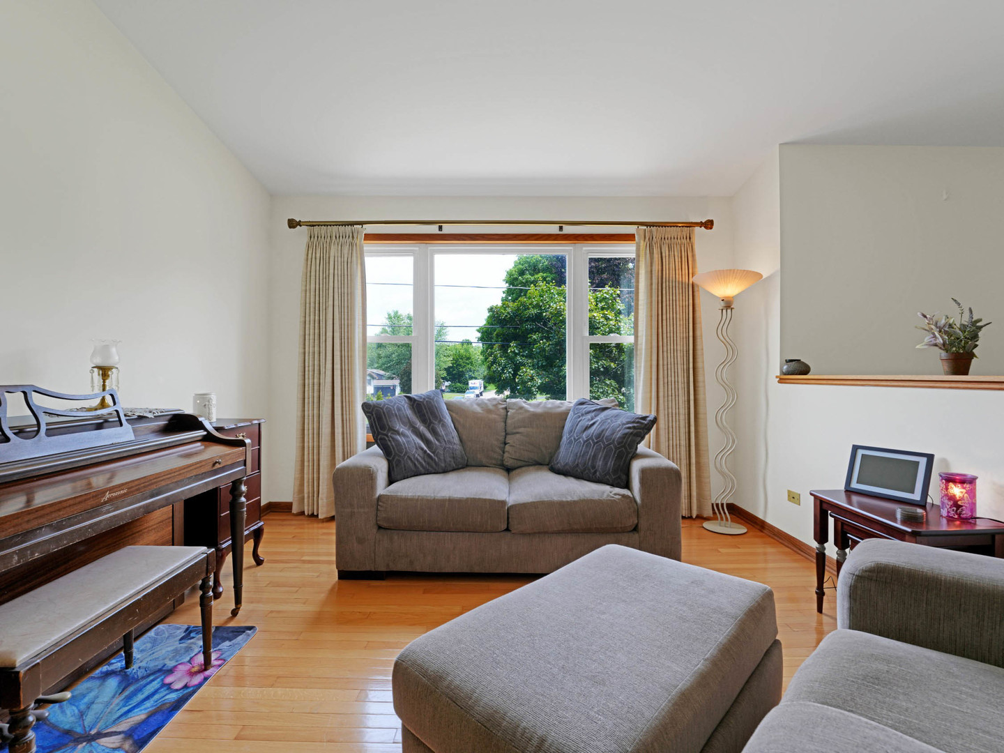58 South Beck Road Lindenhurst, IL 60046 - Photo 15 of 37 a living room with furniture and a large window