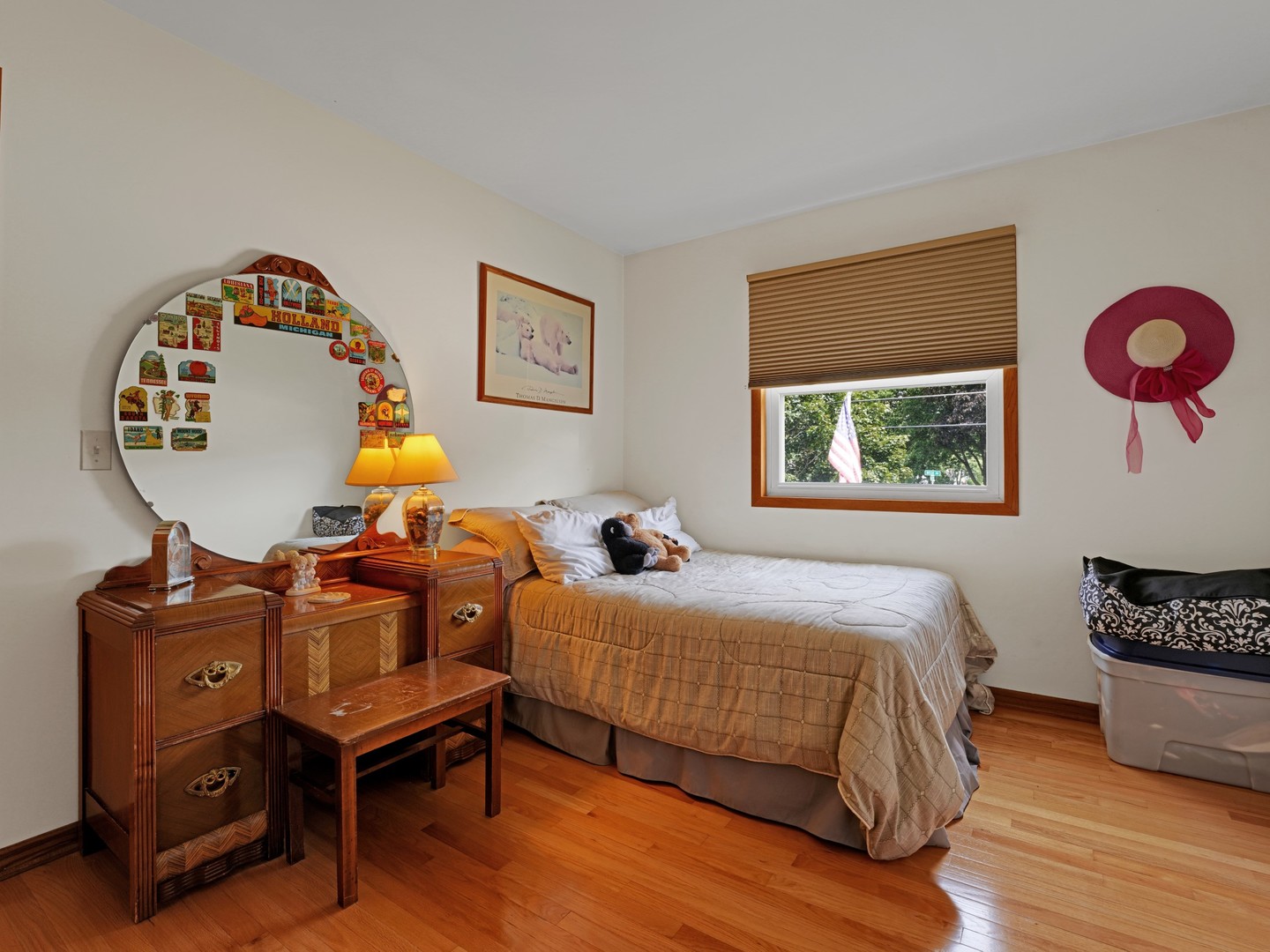 58 South Beck Road Lindenhurst, IL 60046 - Photo 19 of 37 a bedroom with a bed and wooden floor