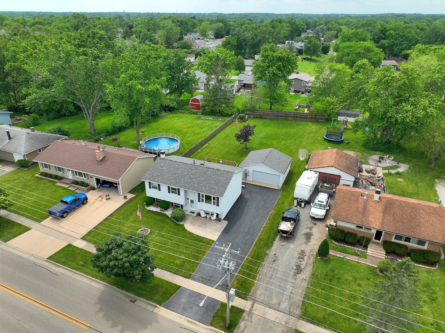 58 South Beck Road Lindenhurst, IL 60046 - Photo 2 of 37 an aerial view of a house with garden space and street view