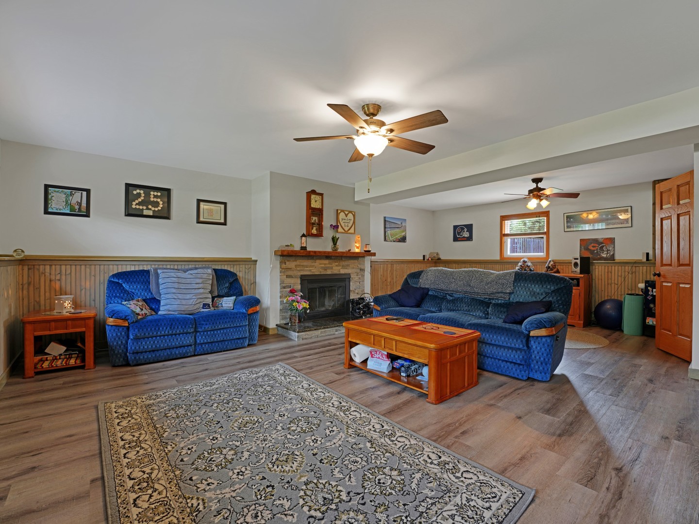 58 South Beck Road Lindenhurst, IL 60046 - Photo 25 of 37 a living room with furniture and a chandelier