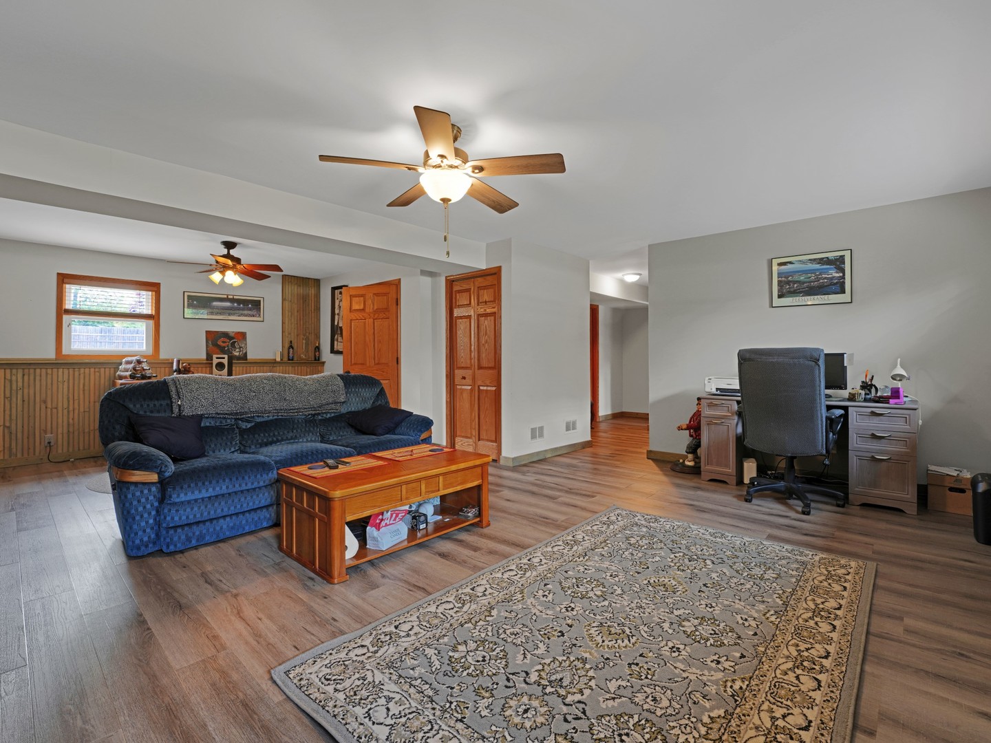 58 South Beck Road Lindenhurst, IL 60046 - Photo 27 of 37 a living room with furniture and a flat screen tv
