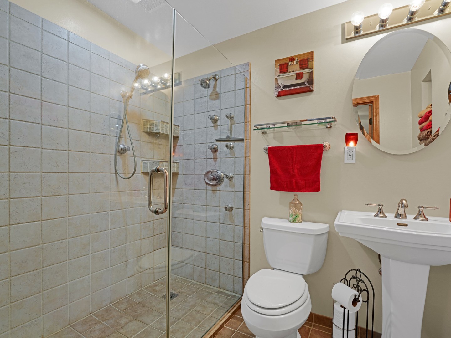 58 South Beck Road Lindenhurst, IL 60046 - Photo 29 of 37 a bathroom with a toilet sink and shower