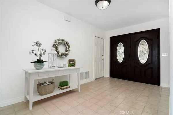 a view of a hallway with entryway