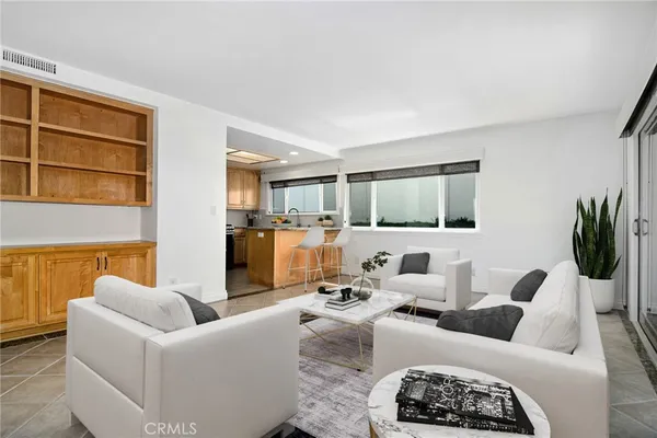 a living room with furniture or couch and a flat screen tv