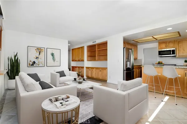a living room with furniture and a table