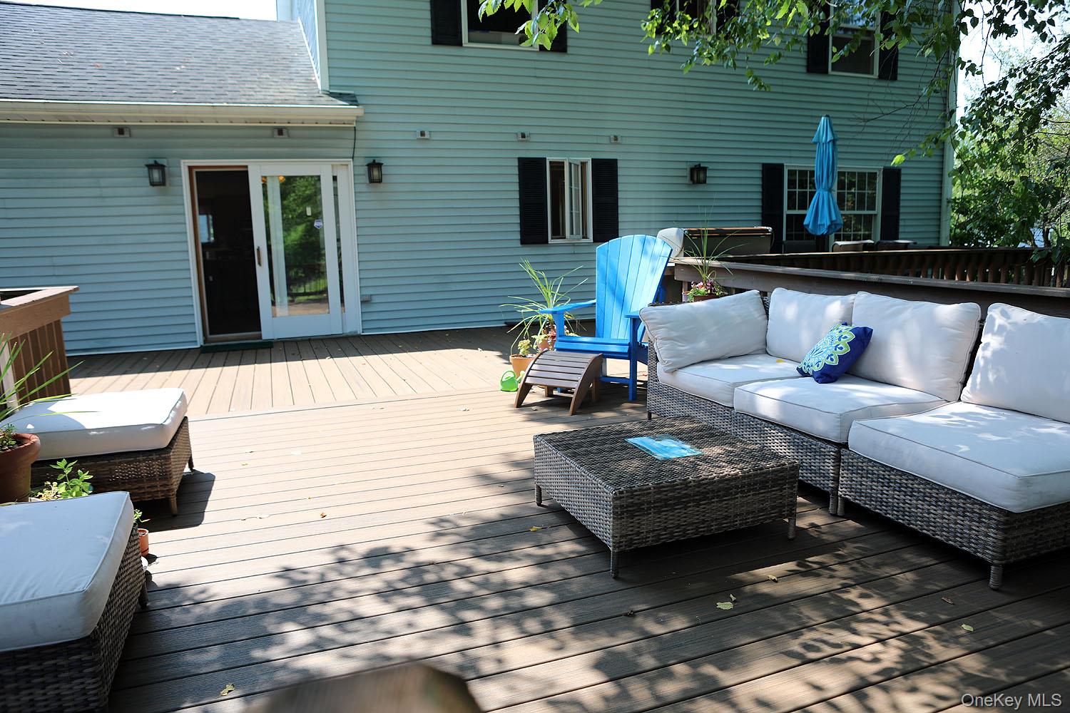 59 Delaware Drive Damascus, PA 18415 - Photo 11 of 24 a view of a patio with couches chairs and a table
