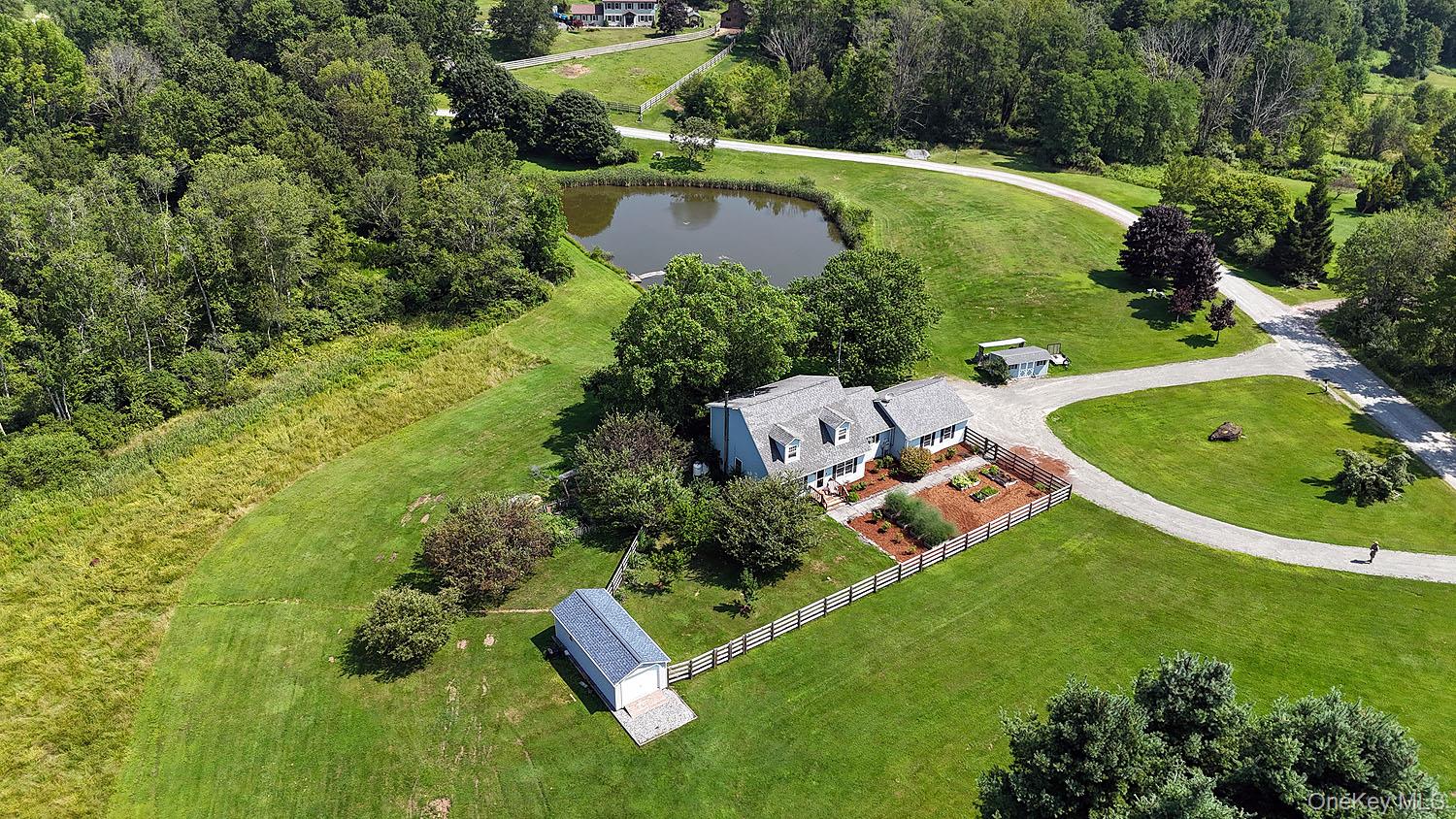 59 Delaware Drive Damascus, PA 18415 - Photo 2 of 24 an aerial view of a house with a yard