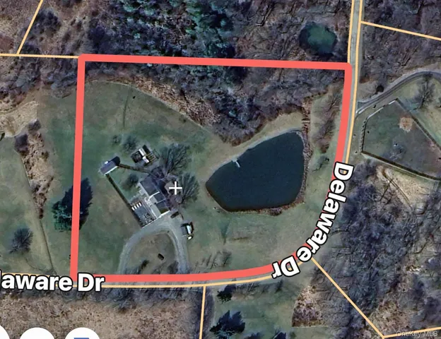 view of a hallway with wooden floor