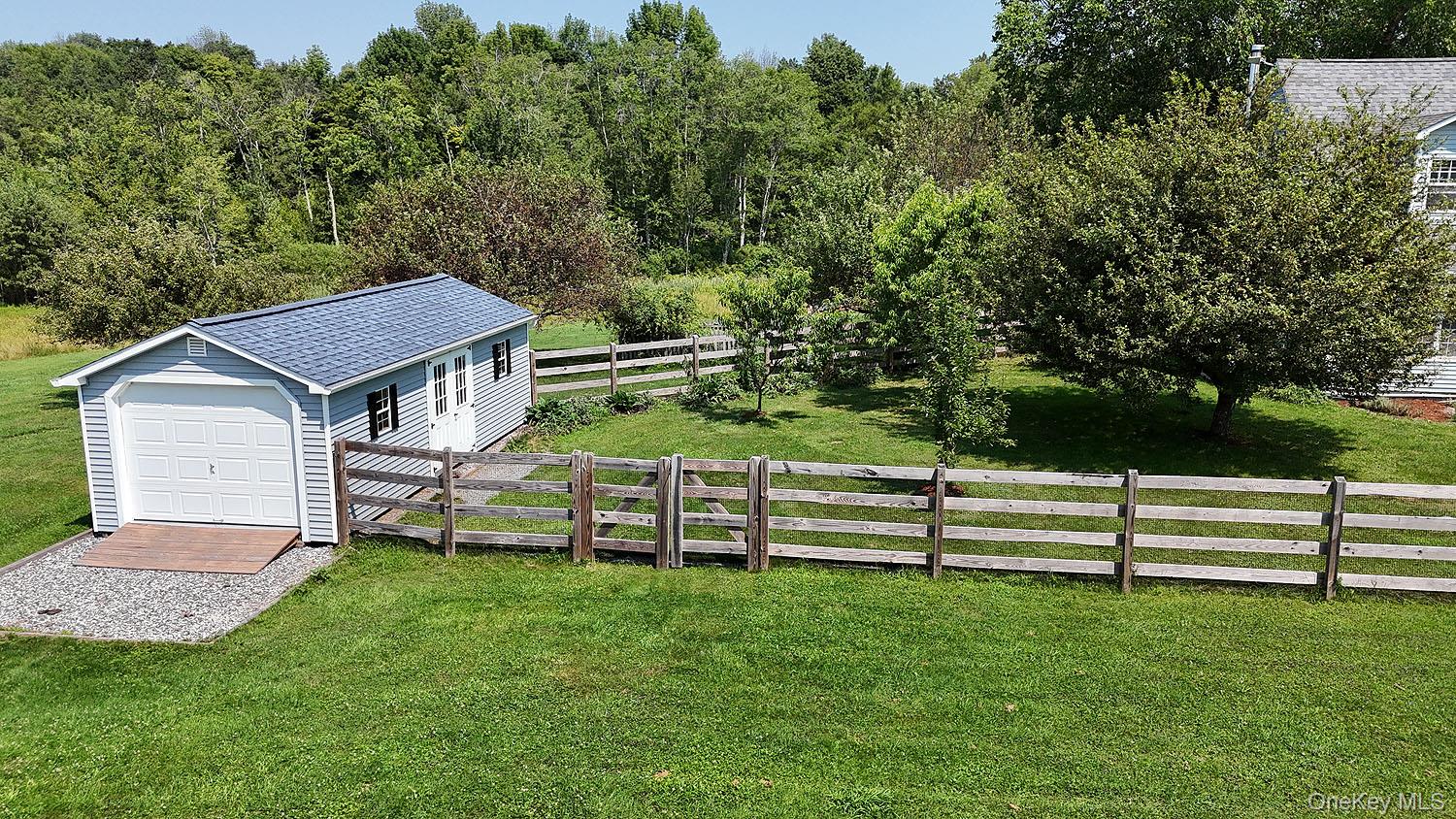 59 Delaware Drive Damascus, PA 18415 - Photo 7 of 24 a view of a house with a yard