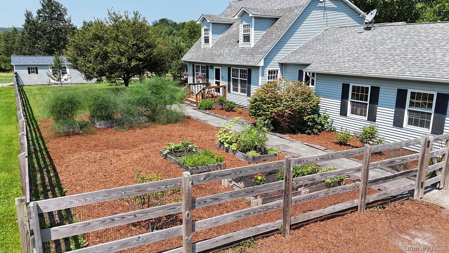 59 Delaware Drive Damascus, PA 18415 - Photo 9 of 24 front view of a house with a yard