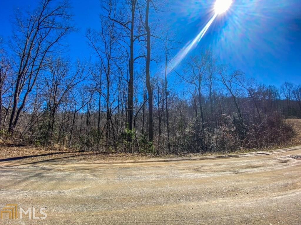 0 Staurolite Mountain Road, Unit LOT 60 Blue Ridge, GA 30513 - Photo 1 of 1 a view of swimming pool next to a house