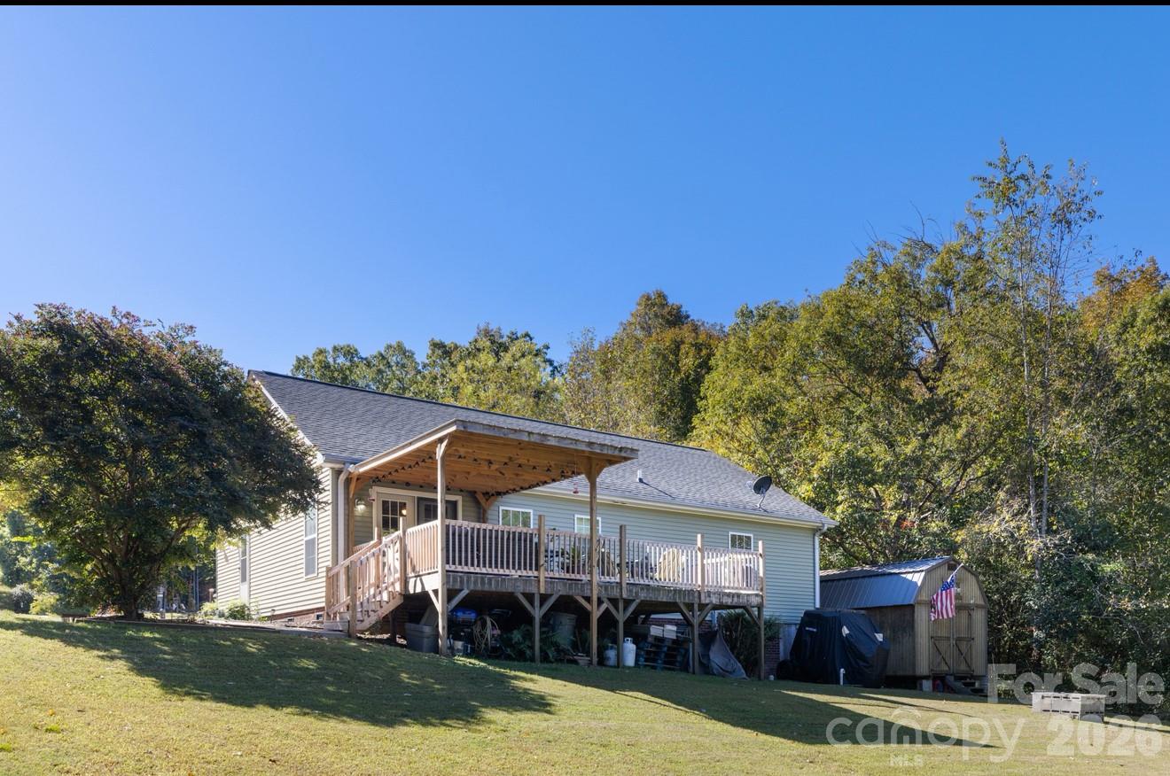 638 Acorn Acres Road Norwood, NC 28128 - Photo 18 of 23 a view of house with outdoor space and swimming pool