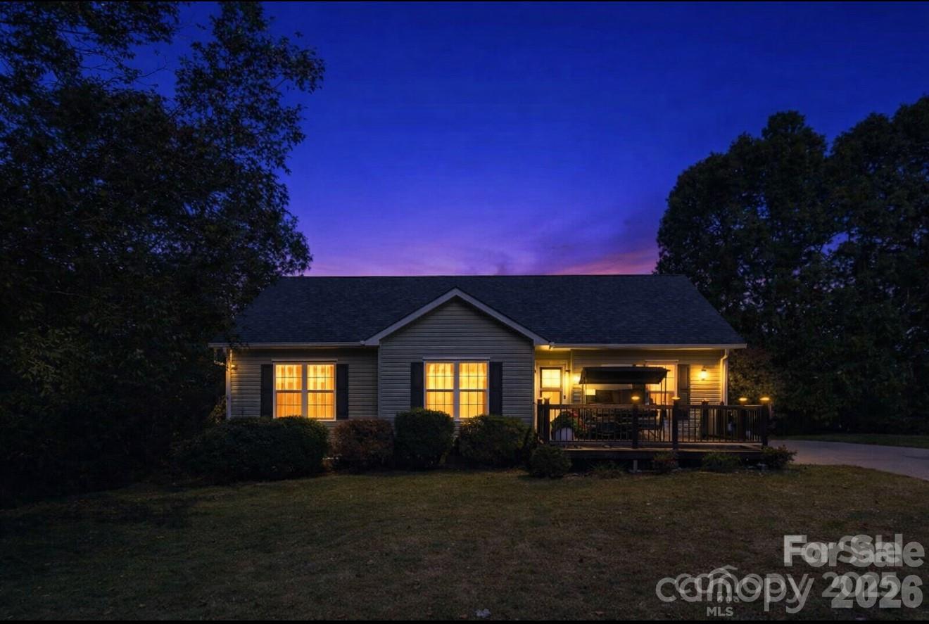 638 Acorn Acres Road Norwood, NC 28128 - Photo 2 of 23 a front view of a house with garden