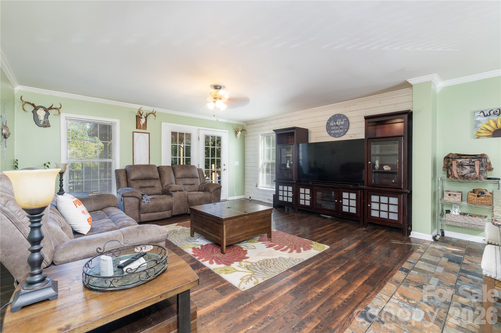 638 Acorn Acres Road Norwood, NC 28128 - Photo 7 of 23 a living room with furniture and a flat screen tv