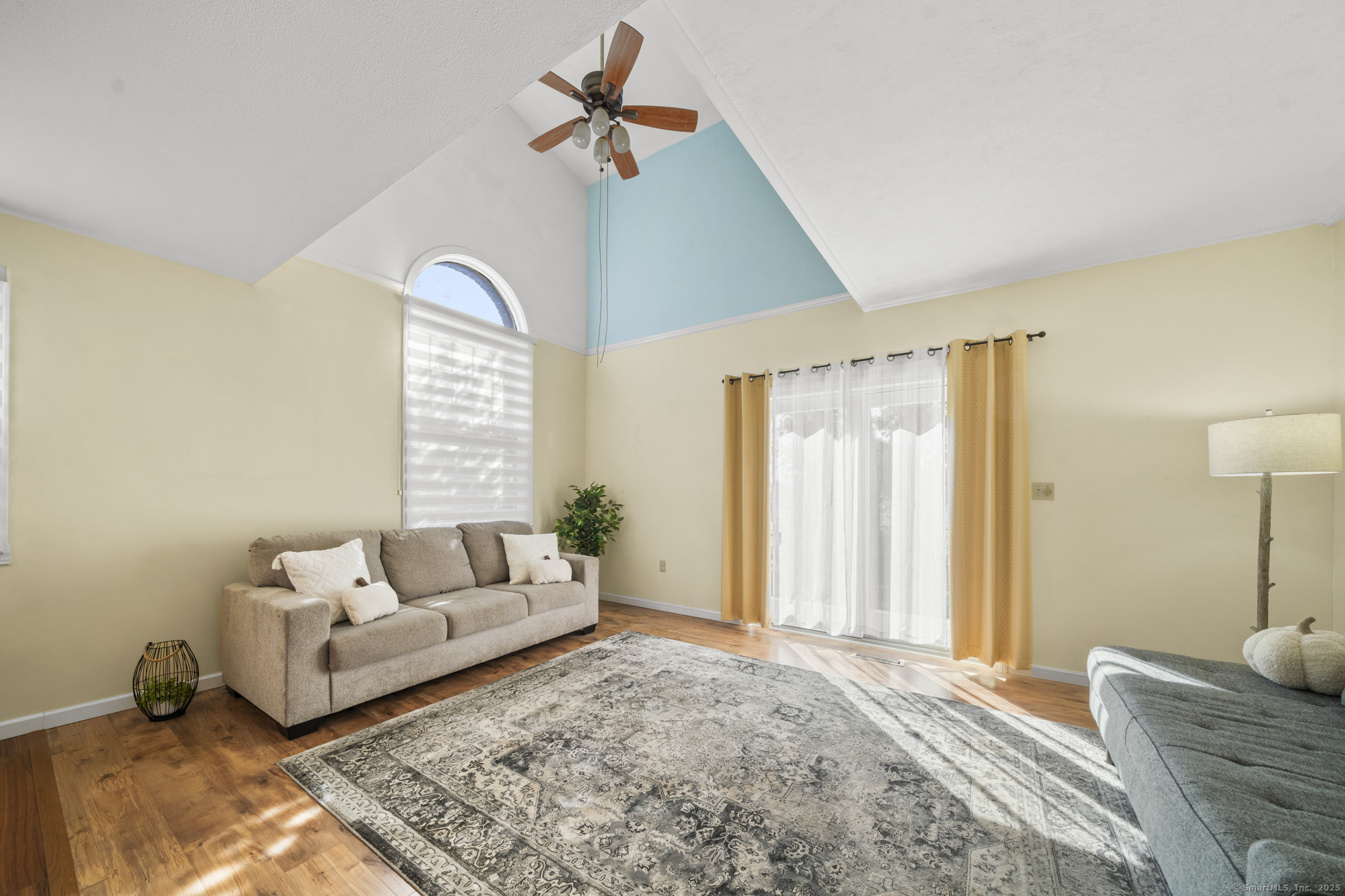 1165 Enfield Street, Unit 11 Enfield, CT 06082 - Photo 8 of 30 a living room with furniture and a window