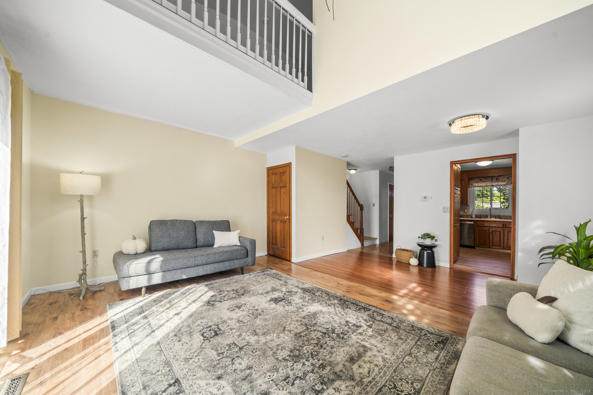 1165 Enfield Street, Unit 11 Enfield, CT 06082 - Photo 9 of 30 a bedroom with a large bed and a couch