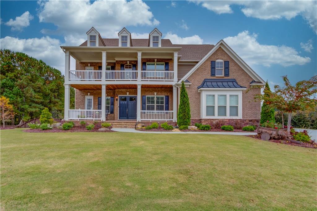 787 Rio Vista Court Suwanee, GA 30024 - Photo 1 of 1 Front Exterior with upgraded double patio elevation