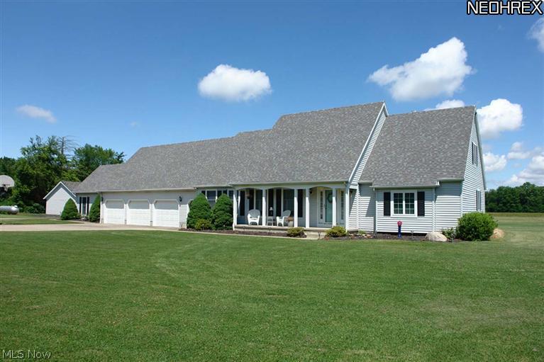 Sprawling Cape Cod on fabulous 4.6 acre lot.