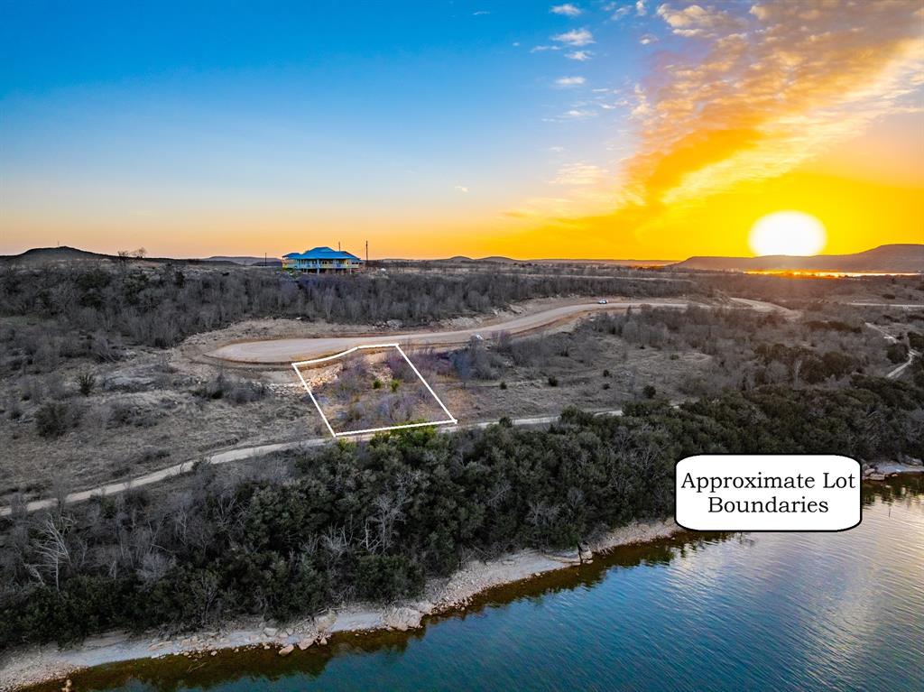 Tbd Tbd Clearwater Point Graham, TX 76450 - Photo 2 of 10 a view of a street with a mountain in the background