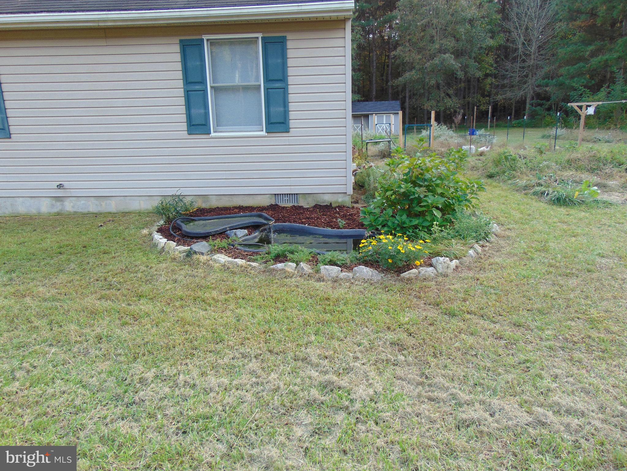 24795 Pinetown Road Denton, MD 21629 - Photo 12 of 60 Water feature in front yard