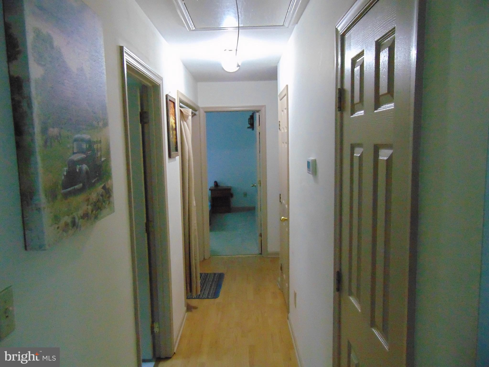 24795 Pinetown Road Denton, MD 21629 - Photo 36 of 60 Looking down the hall into master bedroom