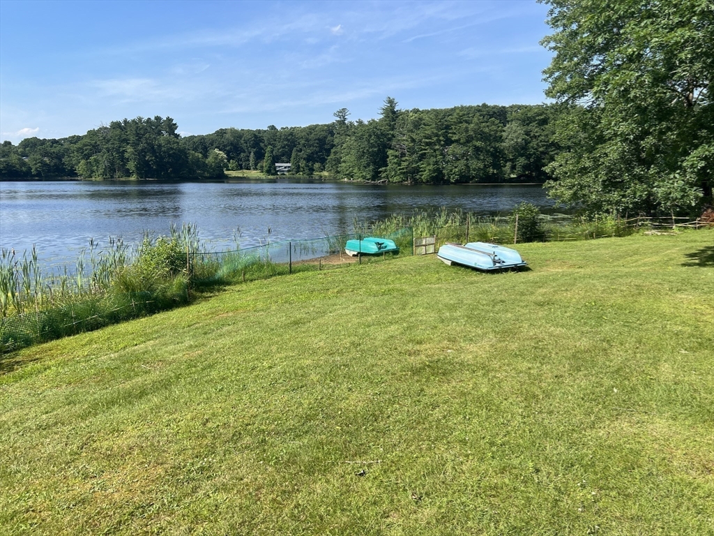 68-74 Sturbridge Road Charlton, MA 01507 - Photo 14 of 41 a view of a lake with houses in the background