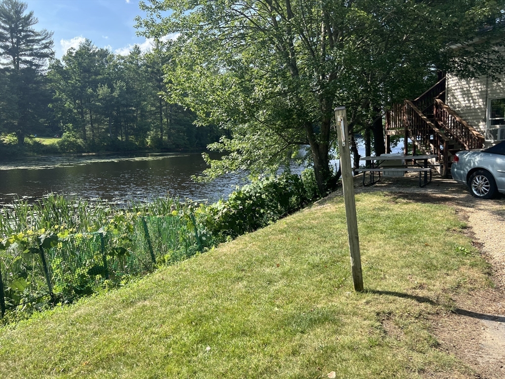 68-74 Sturbridge Road Charlton, MA 01507 - Photo 20 of 41 a view of a garden with a bench