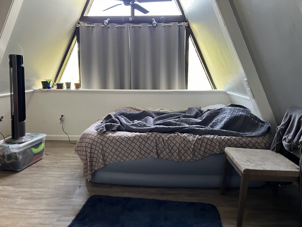 68-74 Sturbridge Road Charlton, MA 01507 - Photo 25 of 41 a living room with a couch and a table