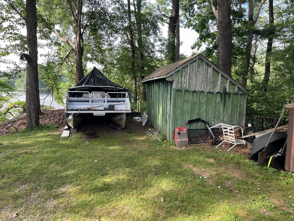 68-74 Sturbridge Road Charlton, MA 01507 - Photo 29 of 41 a view of a house with a yard porch and sitting area