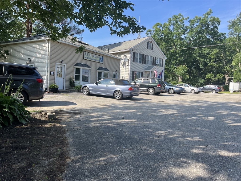 68-74 Sturbridge Road Charlton, MA 01507 - Photo 3 of 41 a view of a car in front of house