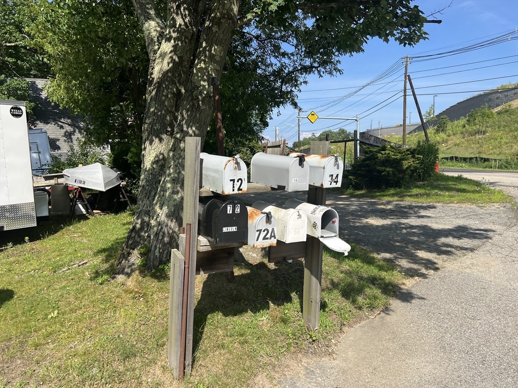 68-74 Sturbridge Road Charlton, MA 01507 - Photo 37 of 41 a garden view with a sitting space