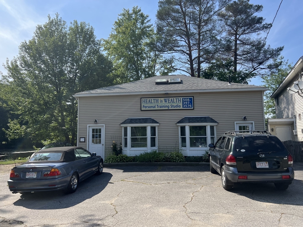68-74 Sturbridge Road Charlton, MA 01507 - Photo 5 of 41 a front view of a house with parking space