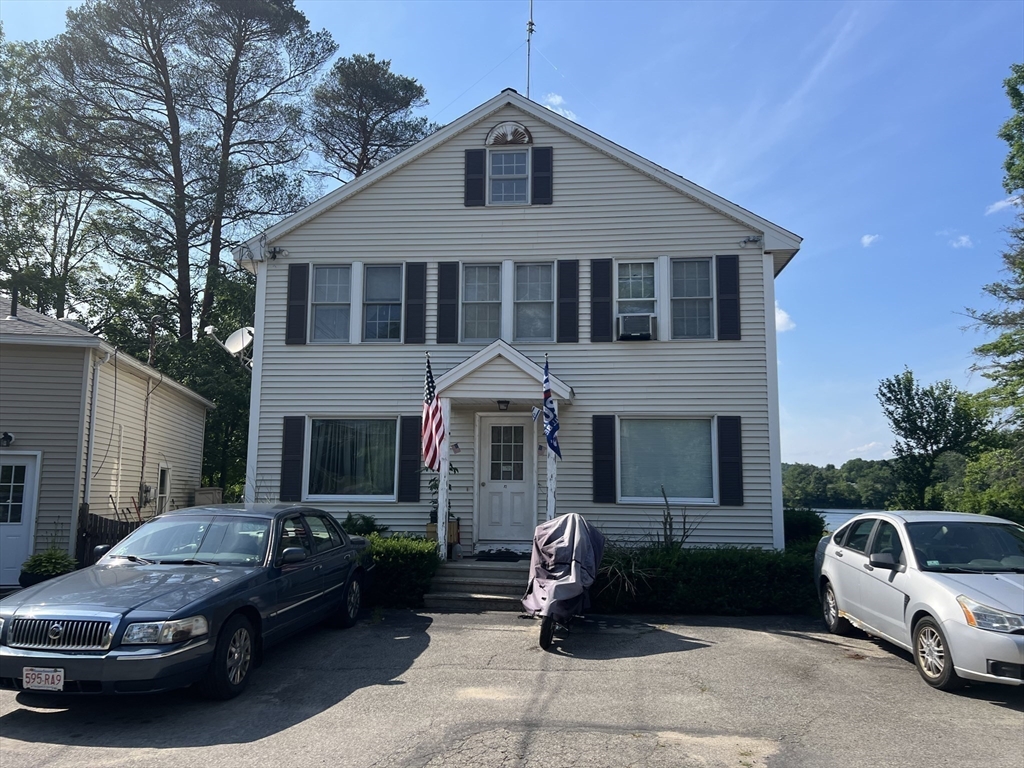 68-74 Sturbridge Road Charlton, MA 01507 - Photo 6 of 41 a front view of a house with parking