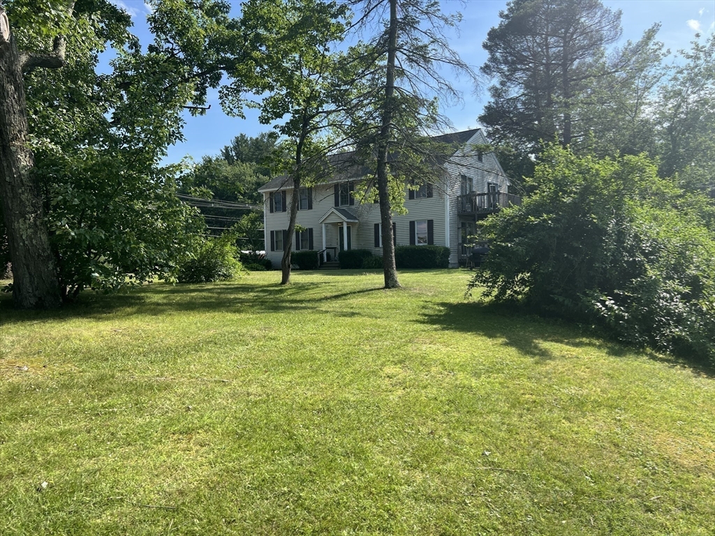 68-74 Sturbridge Road Charlton, MA 01507 - Photo 9 of 41 a view of a trees in front of a house